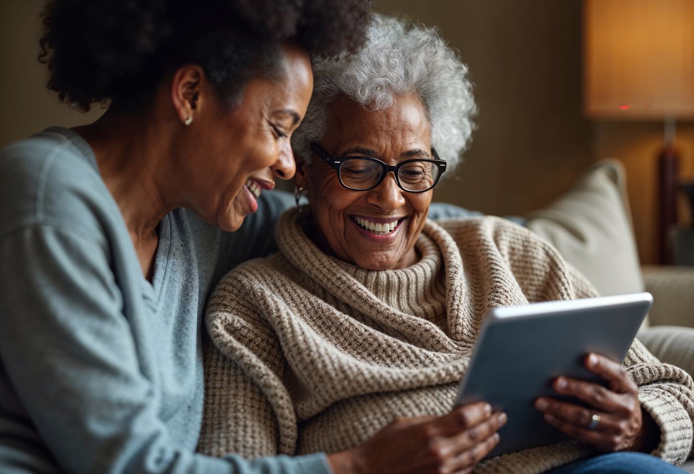Grandmother and daughter using a tablet together